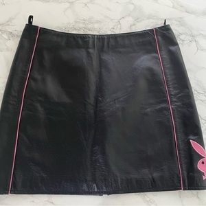 100% leather out shell playboy skirt, inside lining has playboy writing. Size 4